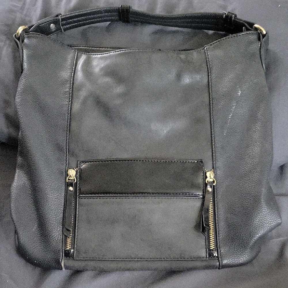 Black Leather Bag by Gussaci.
